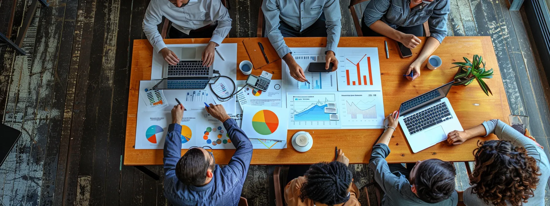 a group of marketers gathered around a conference table, analyzing data and brainstorming ideas for engaging facebook story ads.