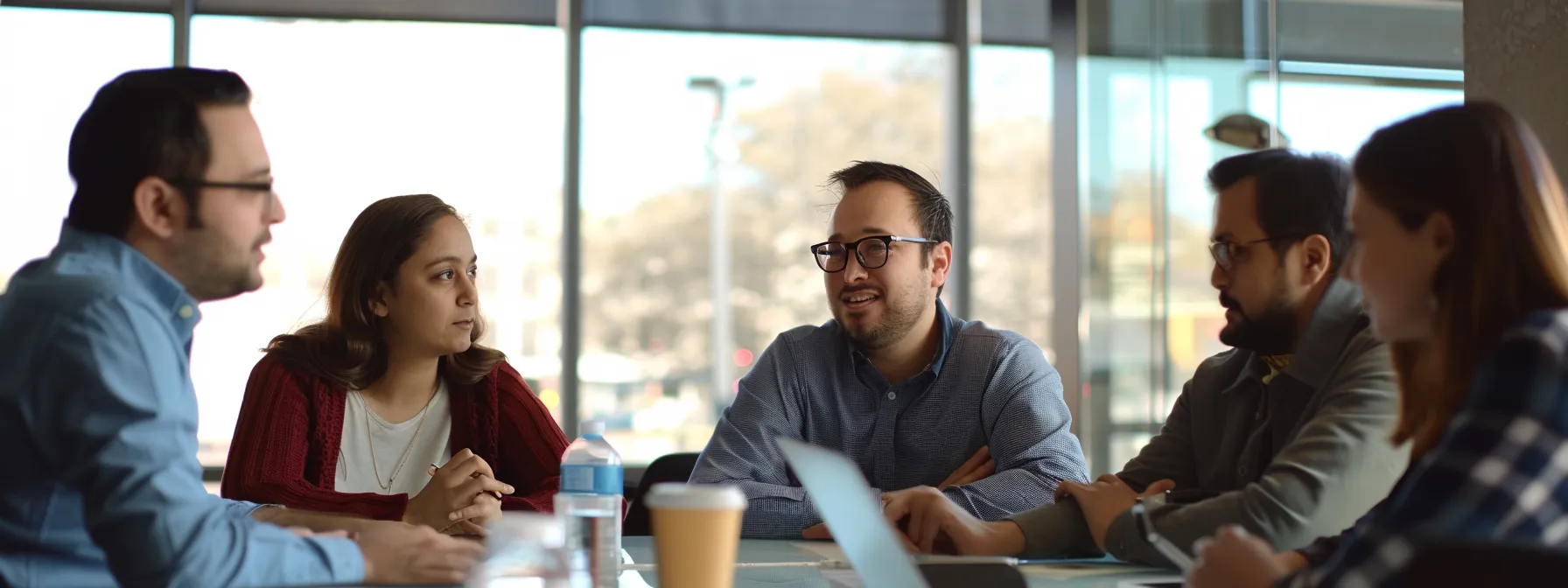 a group of marketers brainstorming around a conference table, planning a demographic targeted campaign.